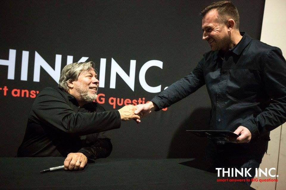 Steve Wozniak shaking hands with Steve McLaughlin