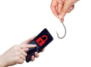 A hand with a fishing hook in it above a mobile phone being held up with a red padlock on it